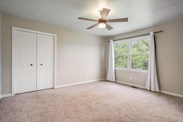 7512 Trophy Ct, Grass Lake, MI 49240 - unfurnished bedroom with carpet, baseboards, and a closet