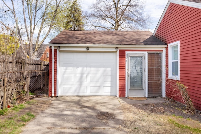 5875 S Madison St, Taylor, MI 48180 - garage with fence and concrete driveway