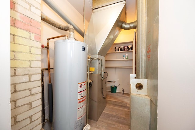 5875 S Madison St, Taylor, MI 48180 - utility room featuring water heater