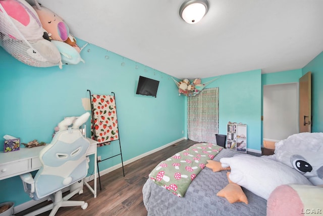 3224 Thornhill Dr, Adrian, MI 49221 - bedroom featuring wood finished floors and baseboards