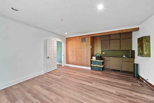 3224 Thornhill Dr, Adrian, MI 49221 - unfurnished living room featuring light wood-style floors, recessed lighting, and baseboards