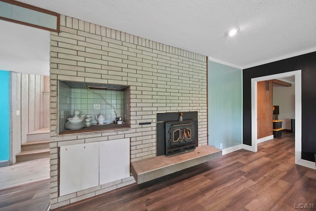 3224 Thornhill Dr, Adrian, MI 49221 - unfurnished living room featuring a textured ceiling, baseboards, wood finished floors, and crown molding