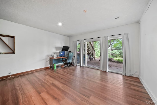 3224 Thornhill Dr, Adrian, MI 49221 - home office featuring wood finished floors, baseboards, and recessed lighting