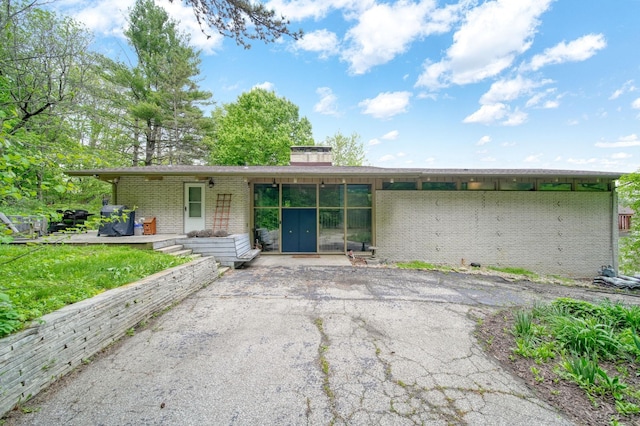 3224 Thornhill Dr, Adrian, MI 49221 - rear view of property with brick siding