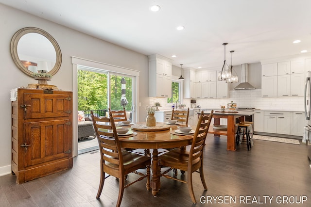 6326 Eaglewood Dr, Hudsonville, MI 49426 - dining space featuring recessed lighting, dark wood finished floors, and a chandelier
