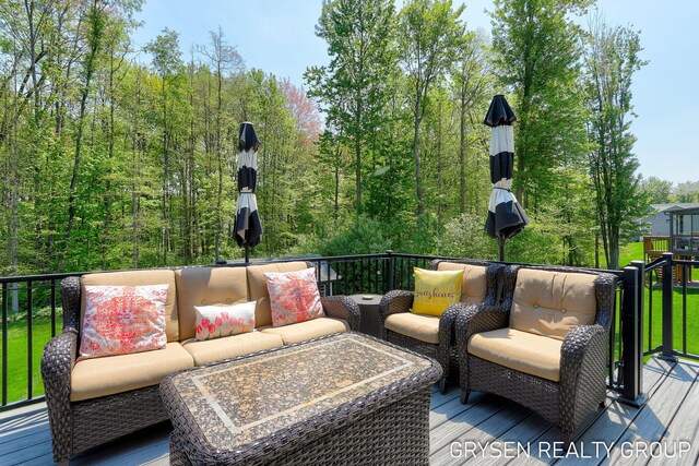 6326 Eaglewood Dr, Hudsonville, MI 49426 - wooden deck with an outdoor living space