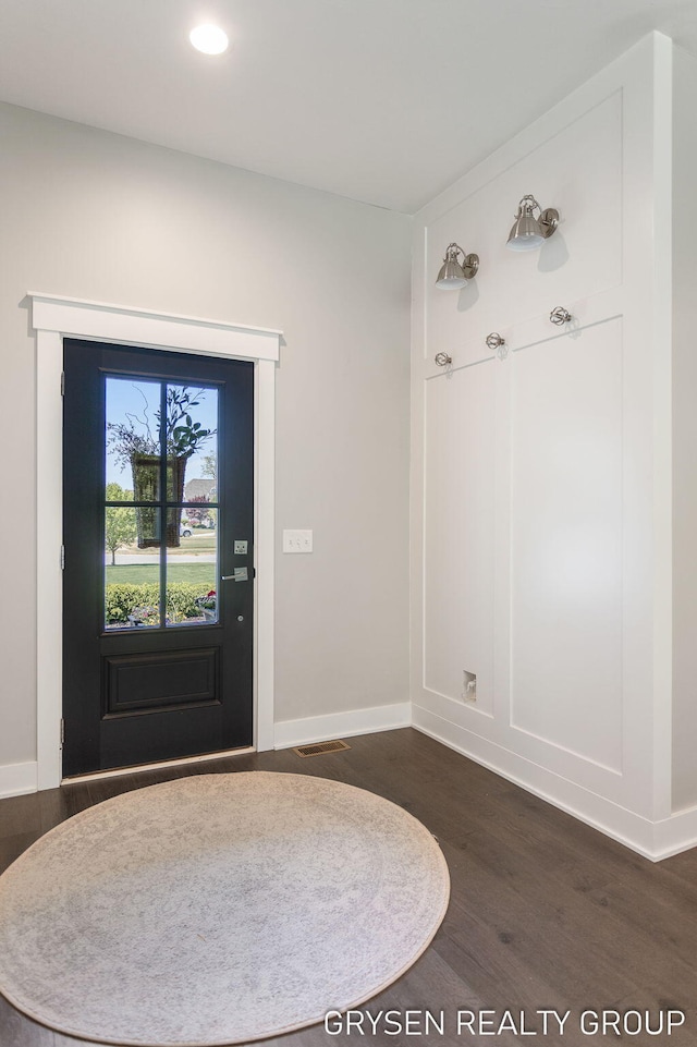 6326 Eaglewood Dr, Hudsonville, MI 49426 - foyer with dark wood-type flooring, baseboards, and recessed lighting