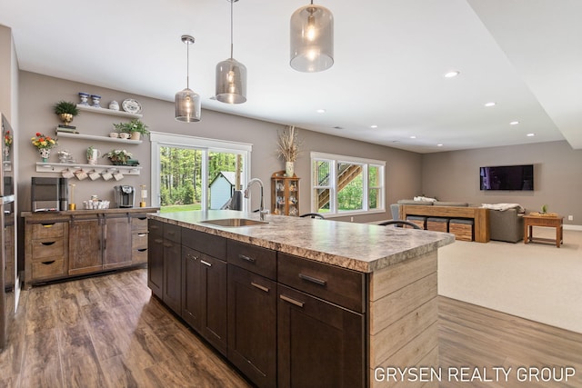 6326 Eaglewood Dr, Hudsonville, MI 49426 - kitchen with a sink, healthy amount of natural light, open shelves, light countertops, and recessed lighting