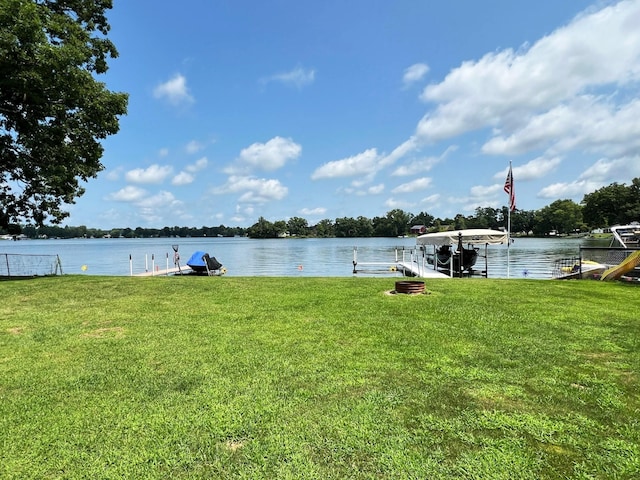 25722 Rainbow Dr, Sturgis, MI 49091 - water view featuring a boat dock and boat lift