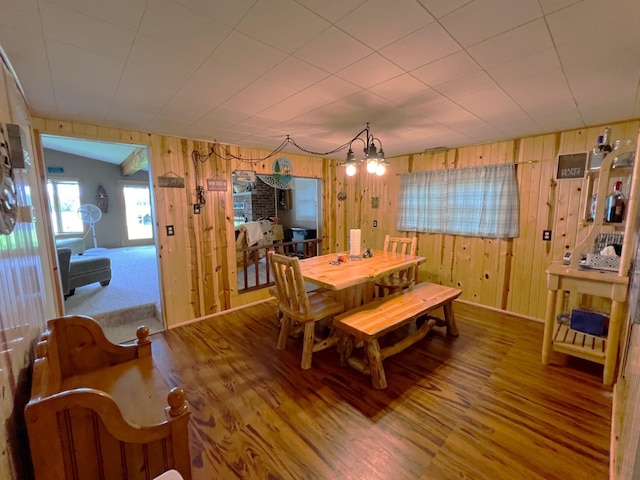 25722 Rainbow Dr, Sturgis, MI 49091 - dining room featuring wood walls and wood finished floors