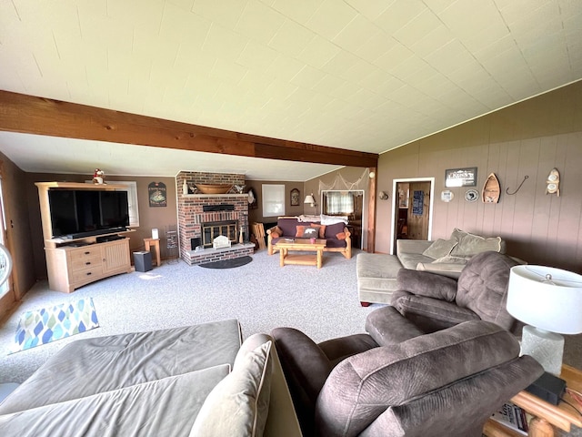 25722 Rainbow Dr, Sturgis, MI 49091 - carpeted living room featuring beamed ceiling, a fireplace, and wooden walls