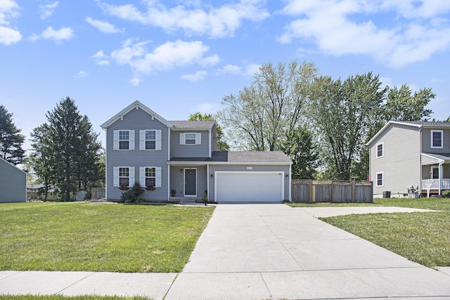 traditional home with a garage and driveway