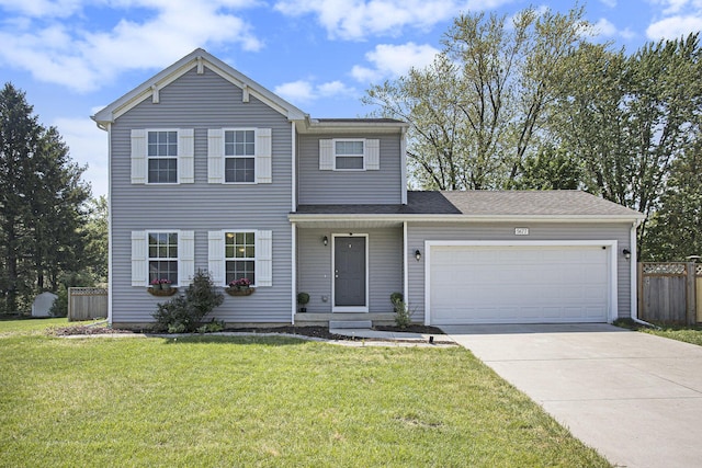 view of front of home with driveway and a garage