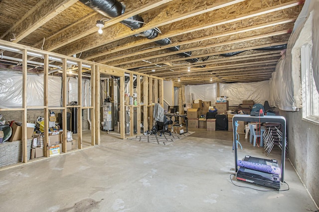 unfinished basement with water heater