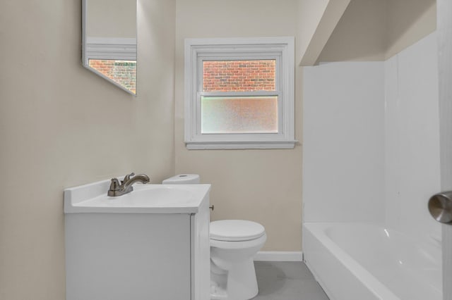 13575 Rutherford St, Detroit, MI 48227 - bathroom with vanity, toilet, baseboards, and tile patterned flooring