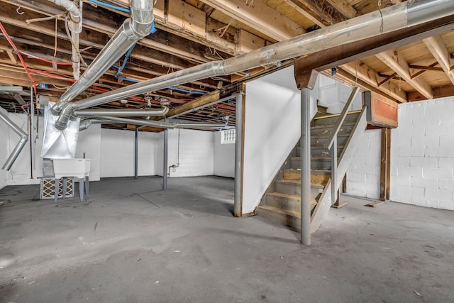13575 Rutherford St, Detroit, MI 48227 - unfinished below grade area with stairway and concrete block wall
