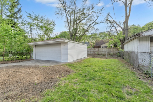 13575 Rutherford St, Detroit, MI 48227 - view of yard with an outdoor structure and a garage
