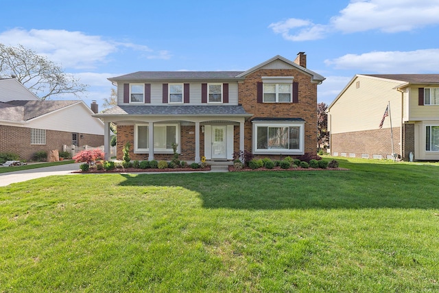 5800 Cliffside Dr, Troy, MI 48085 - traditional-style house with a chimney, brick siding, and a front lawn