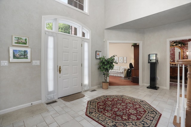 30465 Stonegate Dr, Franklin, MI 48025 - entrance foyer featuring a towering ceiling and baseboards