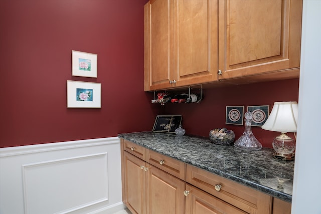 30465 Stonegate Dr, Franklin, MI 48025 - bar area featuring wainscoting and a decorative wall