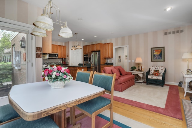 30465 Stonegate Dr, Franklin, MI 48025 - dining room with light wood-style floors, recessed lighting, and baseboards