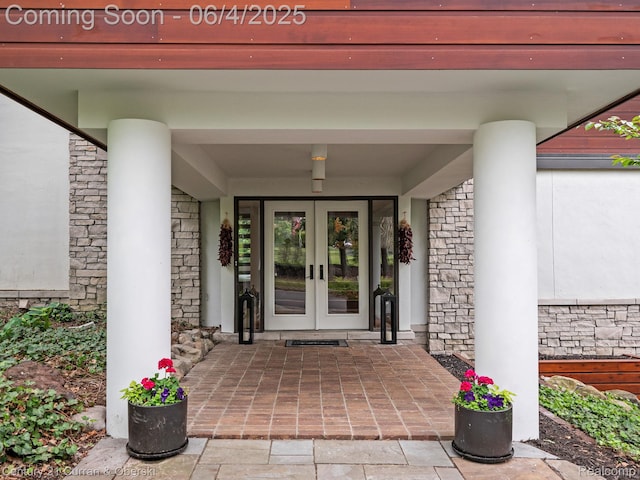 1985 Lone Pine Rd, Bloomfield Hills, MI 48302 - doorway to property with french doors and stone siding