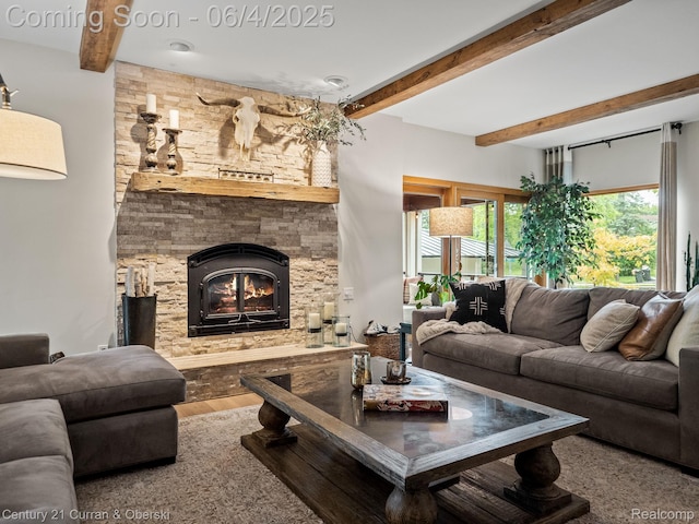 1985 Lone Pine Rd, Bloomfield Hills, MI 48302 - living area featuring beamed ceiling, a fireplace, and wood finished floors
