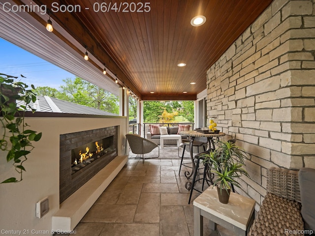 1985 Lone Pine Rd, Bloomfield Hills, MI 48302 - view of patio / terrace featuring an outdoor living space with a fireplace