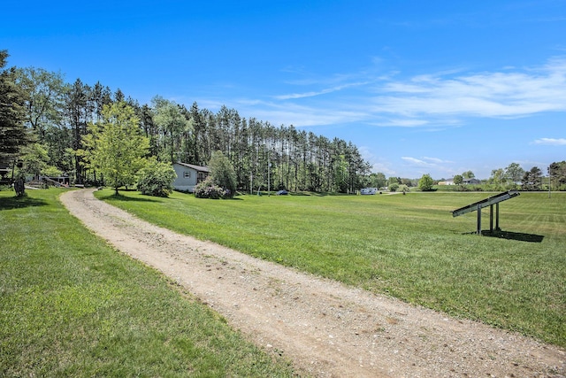 surrounding community with a lawn