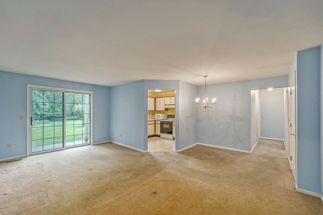 225 Brookwood Dr Unit 4, South Lyon, MI 48178 - unfurnished living room with light carpet, a chandelier, and baseboards