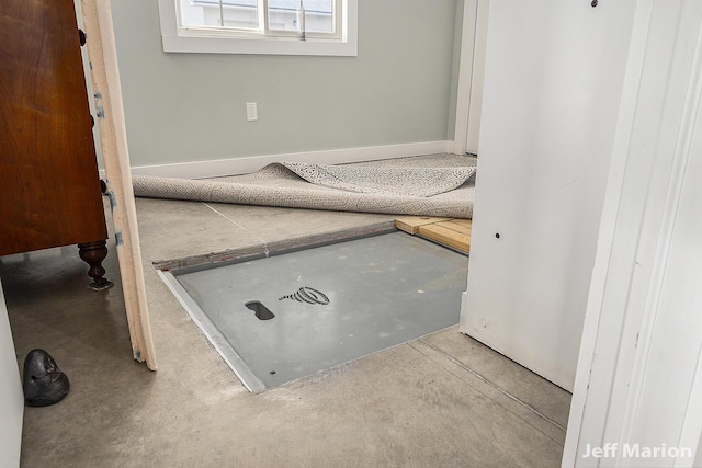 1525 W David Hwy, Ionia, MI 48846 - bathroom with concrete flooring