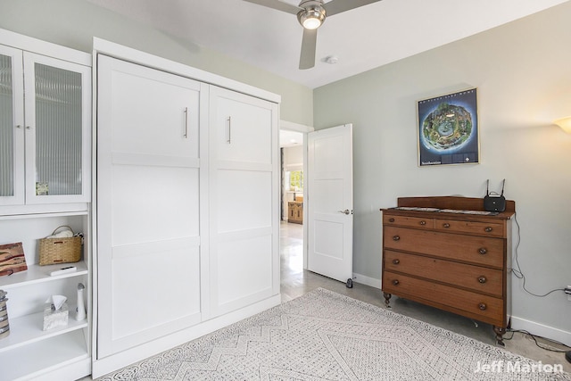 1525 W David Hwy, Ionia, MI 48846 - bedroom featuring baseboards, a closet, and ceiling fan