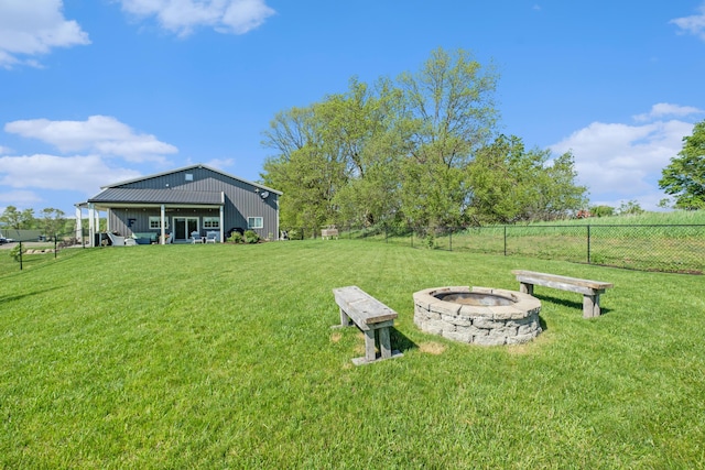 1525 W David Hwy, Ionia, MI 48846 - view of yard featuring an outdoor fire pit