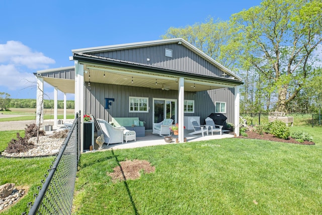 1525 W David Hwy, Ionia, MI 48846 - rear view of property featuring a patio area and an outdoor living space
