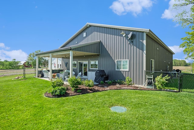 1525 W David Hwy, Ionia, MI 48846 - back of property with a patio and outdoor lounge area
