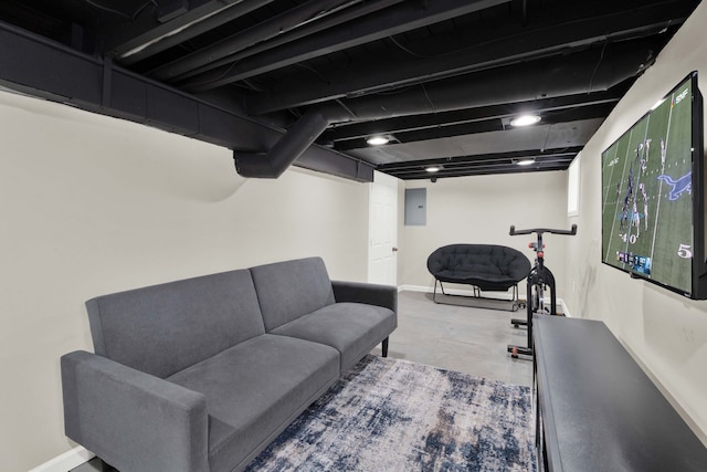 exercise area with electric panel and baseboards