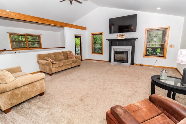 4707 Mount Morris Rd, Columbiaville, MI 48421 - living area featuring carpet floors, lofted ceiling, baseboards, a fireplace with flush hearth, and a ceiling fan
