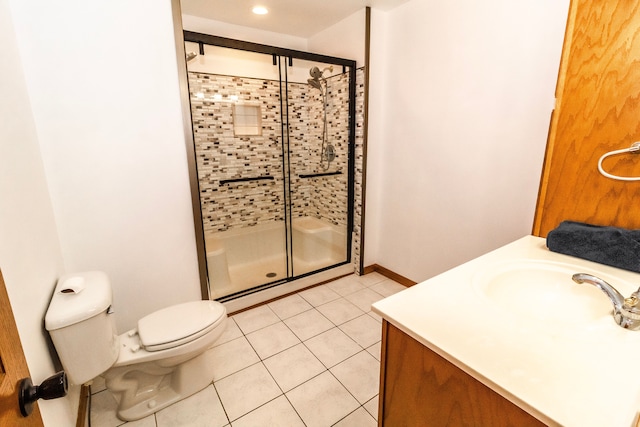 4707 Mount Morris Rd, Columbiaville, MI 48421 - full bath featuring a shower stall, toilet, tile patterned flooring, vanity, and baseboards
