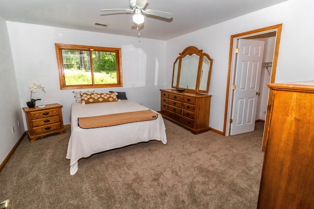 4707 Mount Morris Rd, Columbiaville, MI 48421 - carpeted bedroom featuring baseboards and a ceiling fan