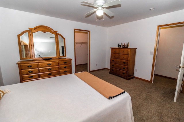 4707 Mount Morris Rd, Columbiaville, MI 48421 - bedroom with a spacious closet, carpet floors, a closet, ceiling fan, and baseboards