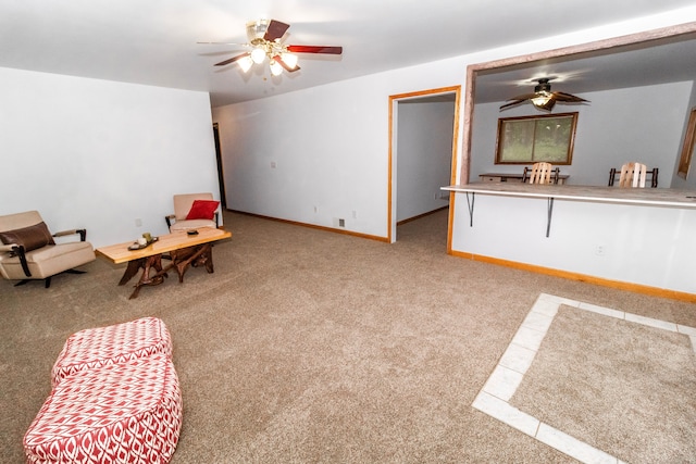 4707 Mount Morris Rd, Columbiaville, MI 48421 - sitting room with a ceiling fan, carpet floors, and baseboards
