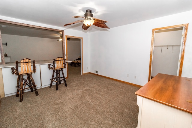 4707 Mount Morris Rd, Columbiaville, MI 48421 - carpeted living area with a ceiling fan and baseboards
