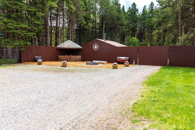 4707 Mount Morris Rd, Columbiaville, MI 48421 - view of property exterior featuring fence and driveway