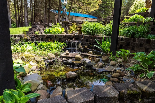 4707 Mount Morris Rd, Columbiaville, MI 48421 - view of yard with a garden pond