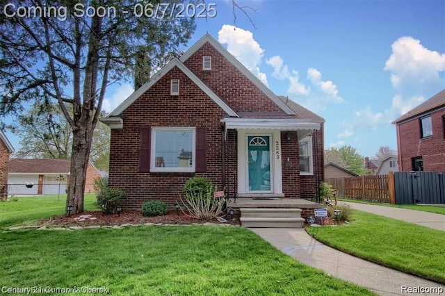 2283 23rd St, Wyandotte, MI 48192 - view of front of house featuring brick siding