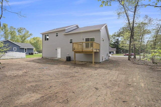 370 Chopin Dr, Muskegon, MI 49442 - rear view of house with central AC unit and a deck