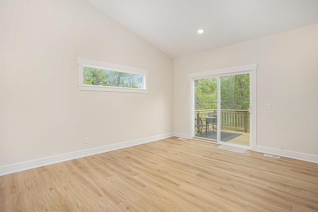 370 Chopin Dr, Muskegon, MI 49442 - empty room with baseboards, light wood-type flooring, lofted ceiling, and recessed lighting