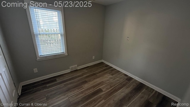 648 W Hazelhurst St, Ferndale, MI 48220 - unfurnished room featuring dark wood-style floors and baseboards