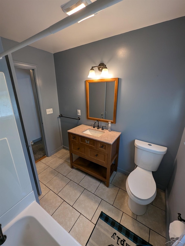 4515 N Michigan Rd, Carrollton, MI 48604 - bathroom with tile patterned flooring, vanity, toilet, and baseboards