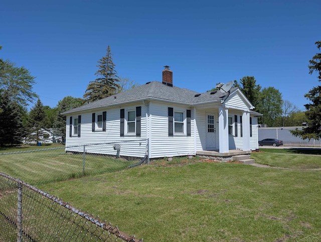 4515 N Michigan Rd, Carrollton, MI 48604 - view of front of home with a chimney, a shingled roof, and a porch
